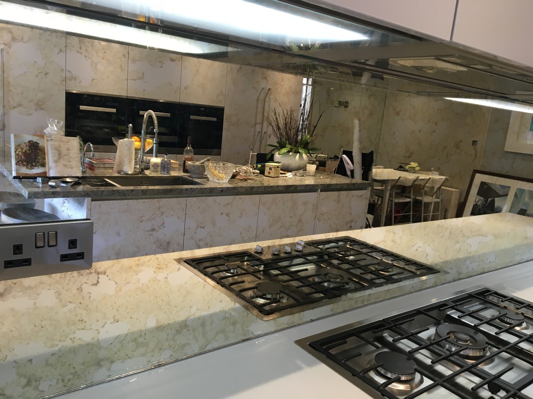 Mirror glass splashback in Chesham luxury kitchen